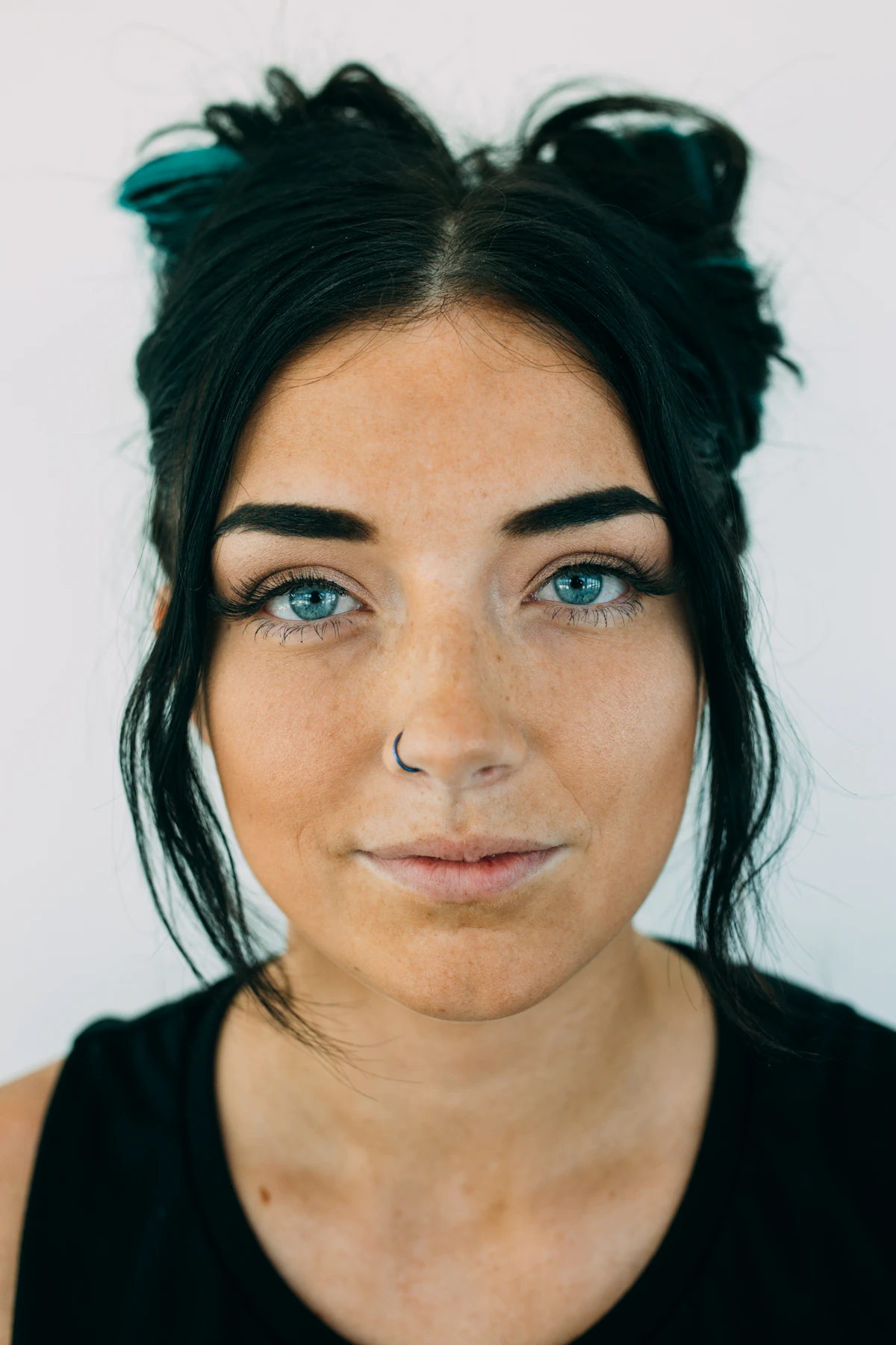 Woman with elegant natural makeup, embodying Mahriza's brand values